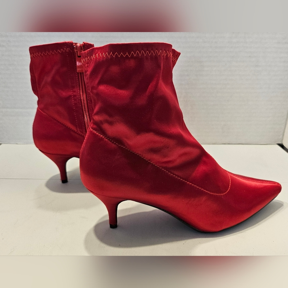 Chic brand red satin stretch boot heel.
